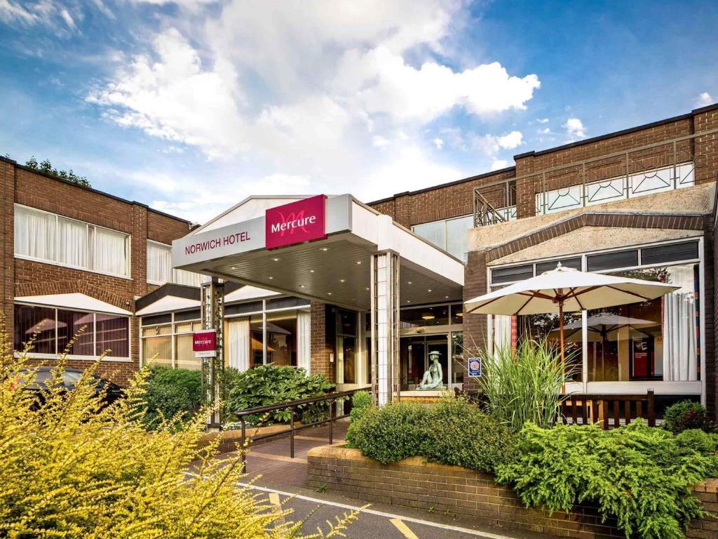 a building with a sign on the front of it at Mercure Norwich Hotel in Norwich