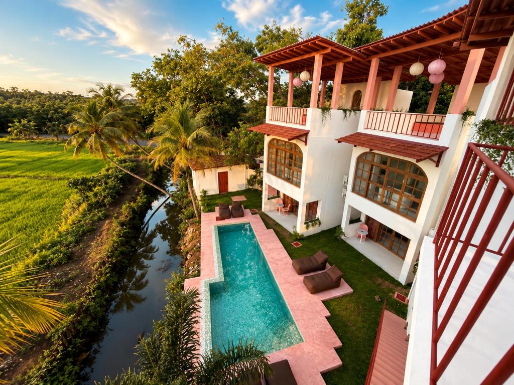 an aerial view of a house with a swimming pool at Navi - Boutique Hotel - Adults Only in Ahangama