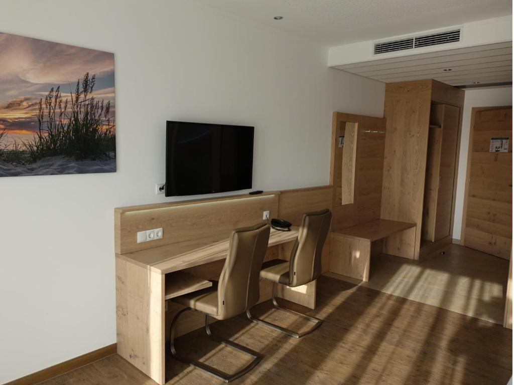 TV a/nebo společenská místnost v ubytování Seminarhotel Daniels