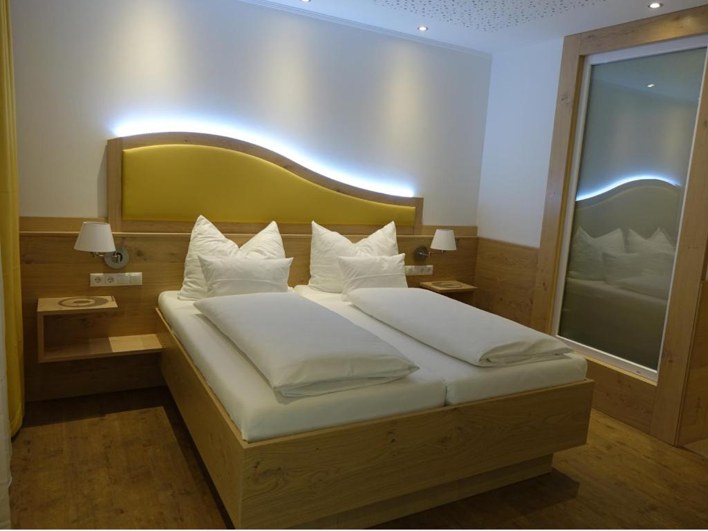 Postel nebo postele na pokoji v ubytování Seminarhotel Daniels