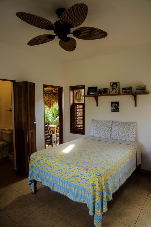 Postel nebo postele na pokoji v ubytování KuDehya Guesthouse
