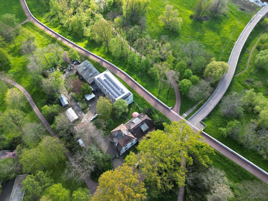 an aerial view of a house and train tracks at Herberge Vitopia in Magdeburg