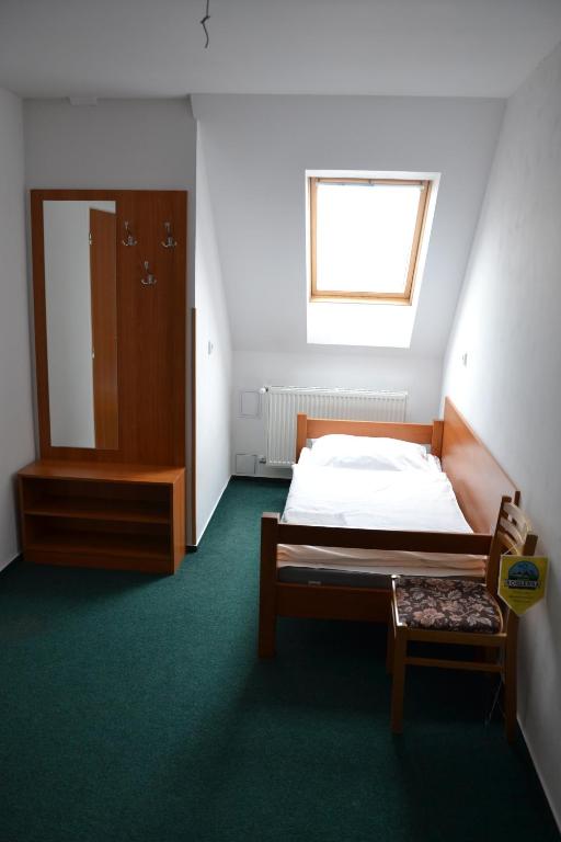 Voodi või voodid majutusasutuse Motorest a Motel Rohlenka Austerlitz toas