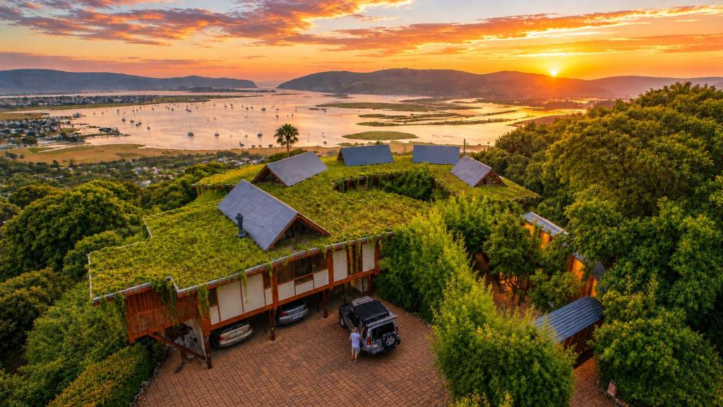 an aerial view of a house with a green roof at Paradise Private Zen Studios in Knysna