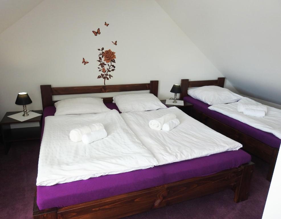 Cama o camas de una habitación en Dovolenkový Dom Tatry