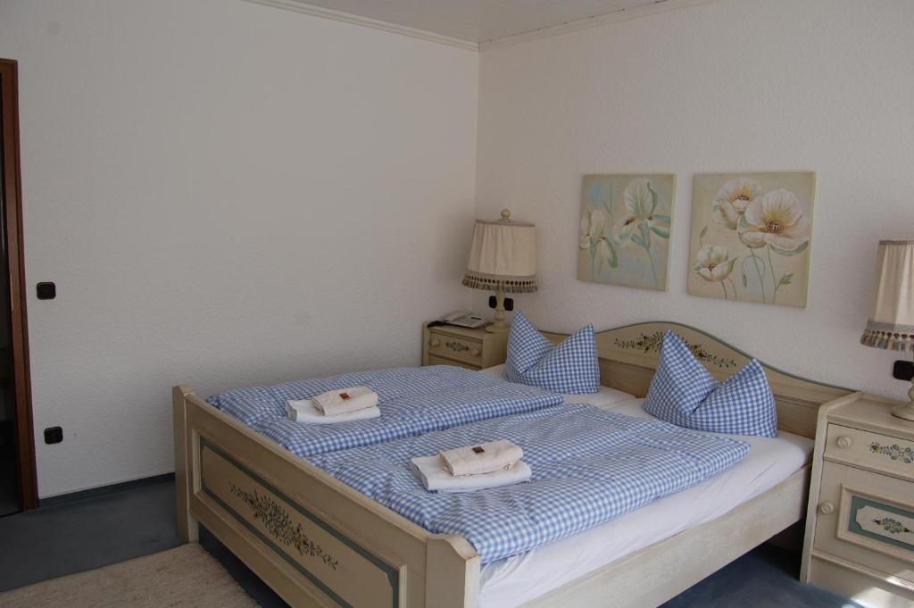 Postel nebo postele na pokoji v ubytování Landhaus Brockenblick