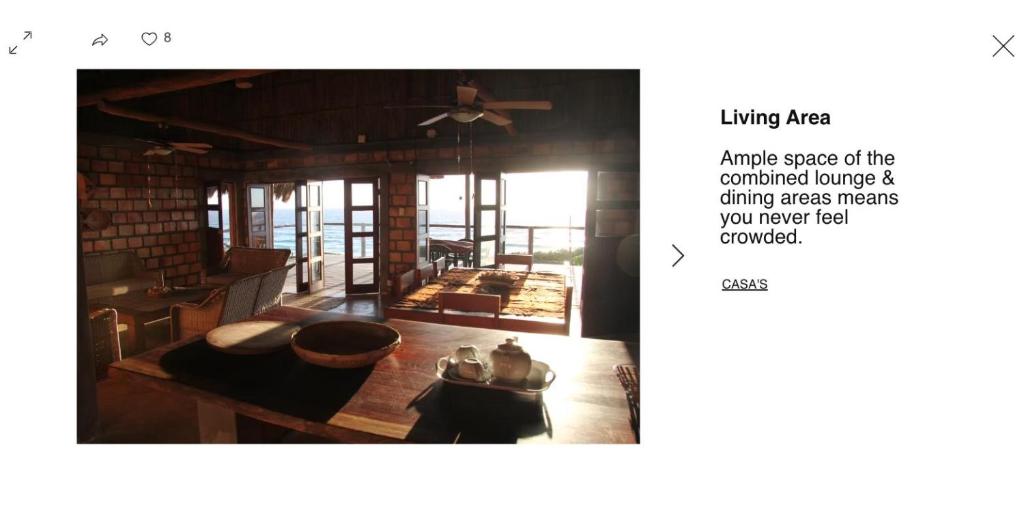 a picture of a living room with a ceiling fan at Mahale Resort - Casa 1 in Jangamo