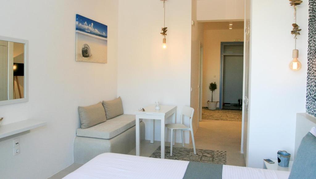 Postel nebo postele na pokoji v ubytování Astropalia Luxury Studios