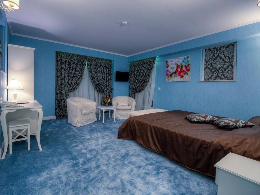 Postel nebo postele na pokoji v ubytování Family Hotel Agoncev