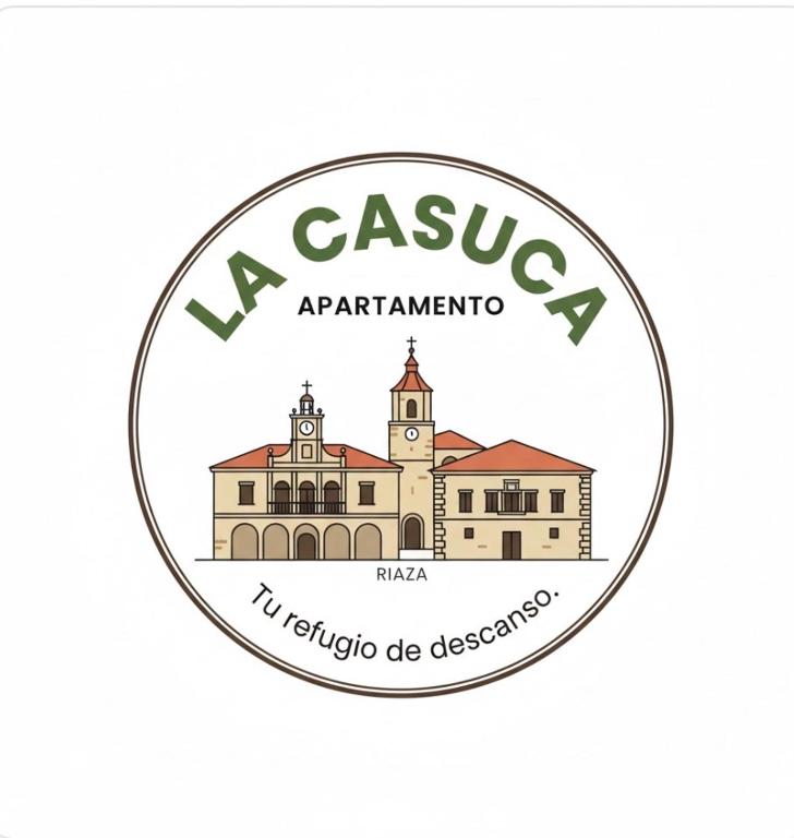 a logo for aacienda in an old building at La Casuca in Riaza