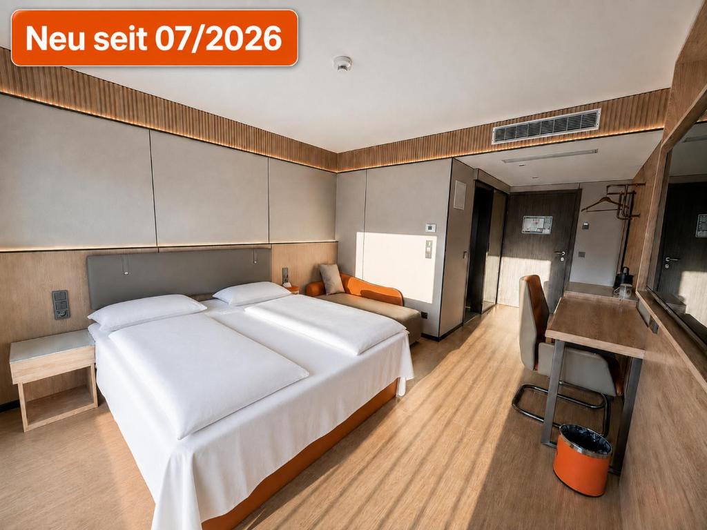 Llit o llits en una habitació de Hotel MUSE
