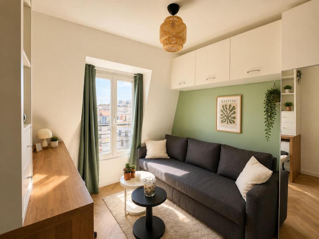 Bright Studio with Iconic Paris Rooftop Sunsets
