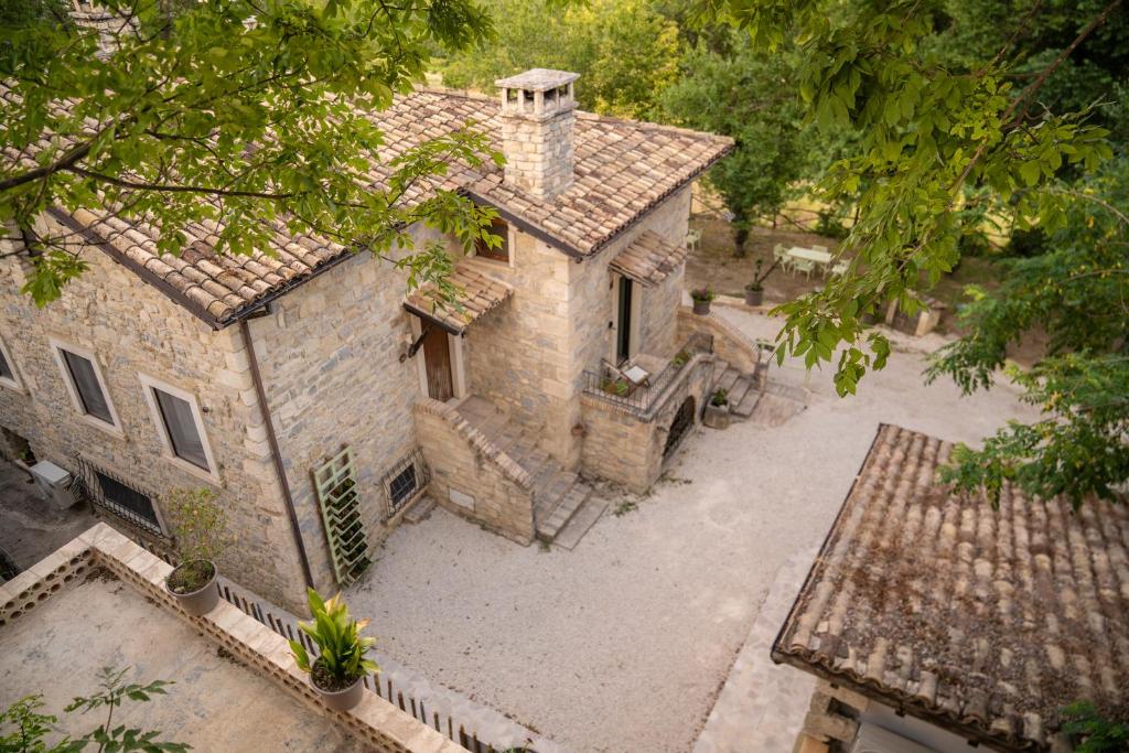 an overhead view of a stone house with a courtyard at Borgo Majella by Rentbeat in Abbateggio