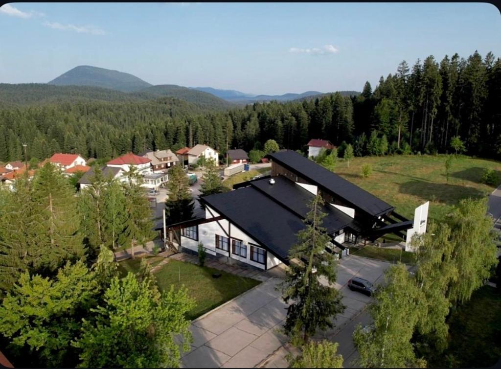 an aerial view of a house with a garage at Hotel Vuković in Han Pijesak