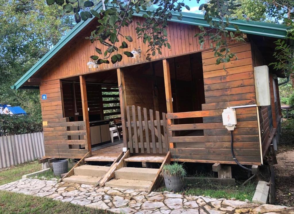 a small wooden cabin with steps leading into it at Bojana Breeze in Ulcinj
