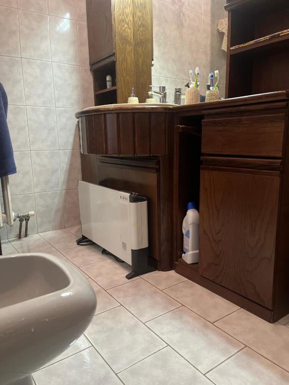 a bathroom with a sink and a bath tub at Dream Homes in Donnaz