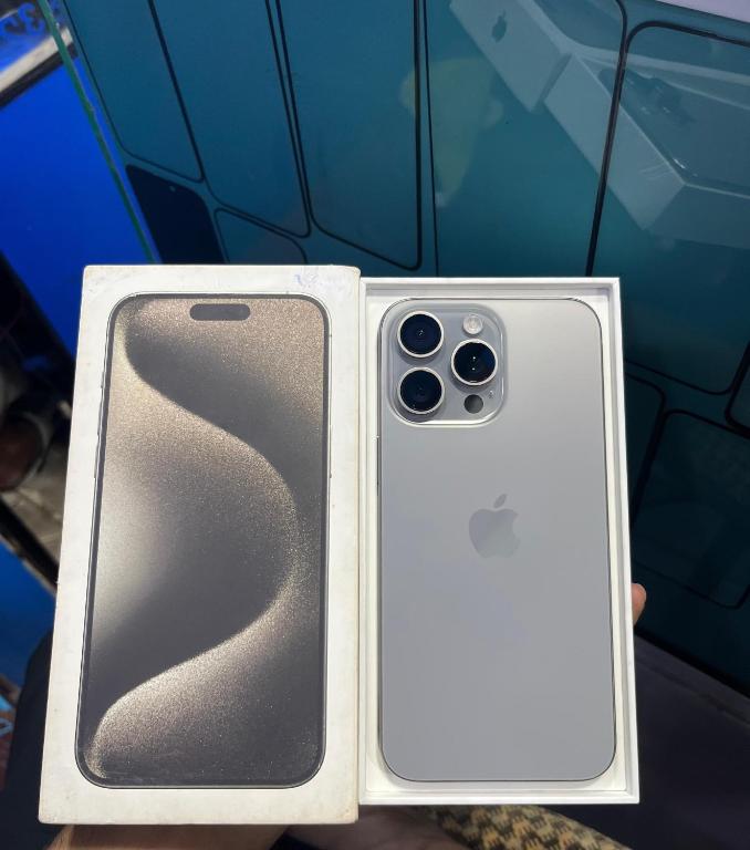 an iphone in a white case in front of a car at Ali in Tammannewa