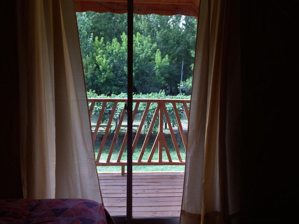 Balkón nebo terasa v ubytování Camping & Hospedaje Rio Laja