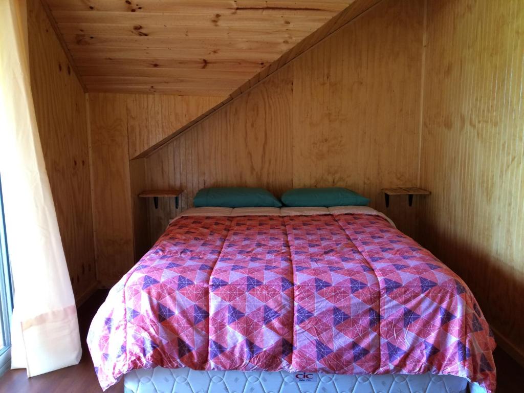 Postel nebo postele na pokoji v ubytování Camping & Hospedaje Rio Laja