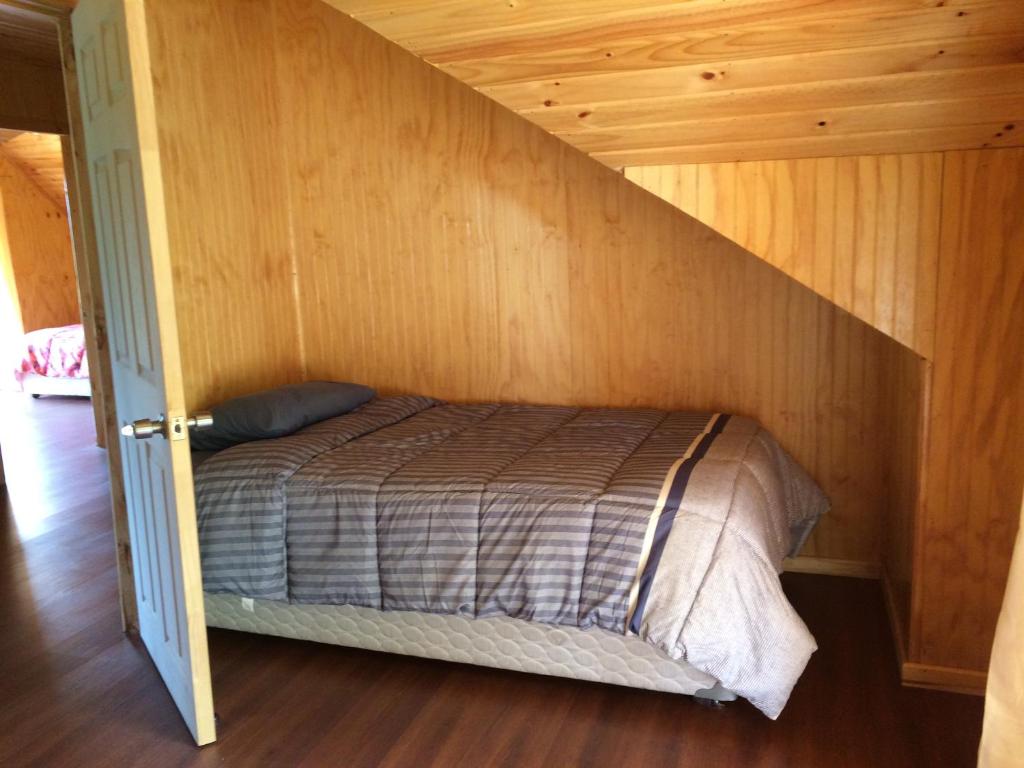 Postel nebo postele na pokoji v ubytování Camping & Hospedaje Rio Laja