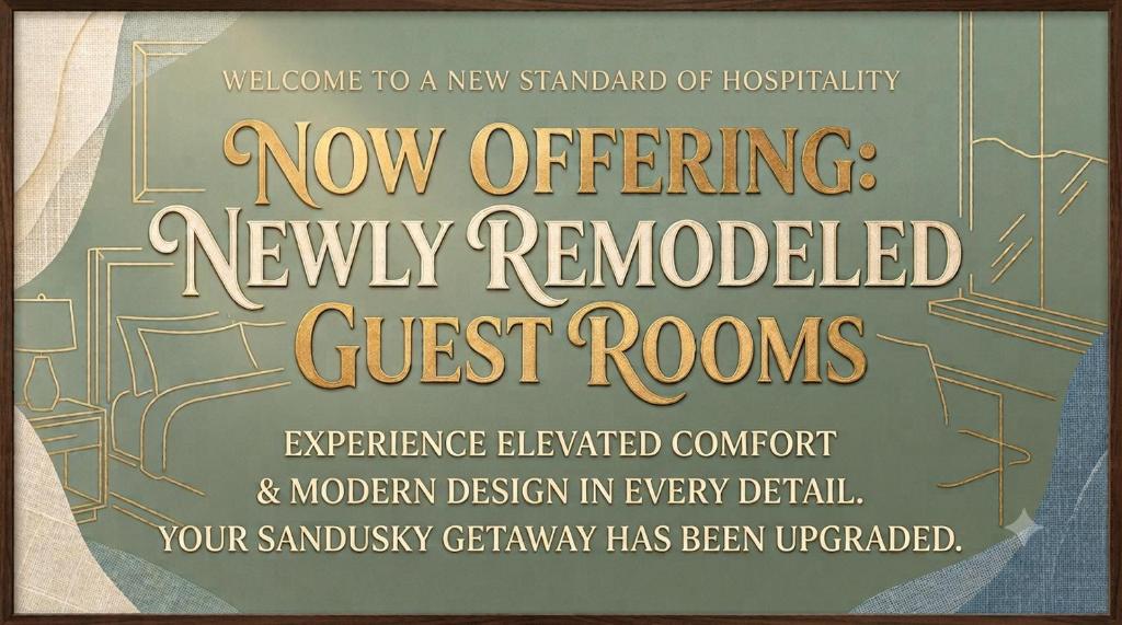 a sign that reads new offering newly remodeled guest rooms at Rodeway Inn Sandusky North in Sandusky
