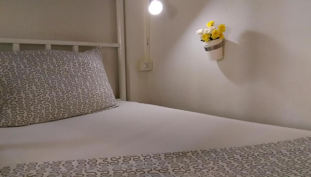 Postel nebo postele na pokoji v ubytování Salsa Hostel