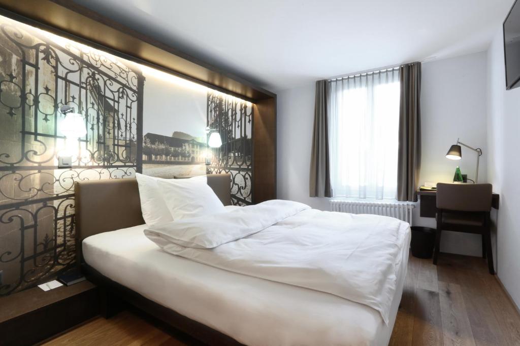 Postel nebo postele na pokoji v ubytování Boutique Hotel St. Georg