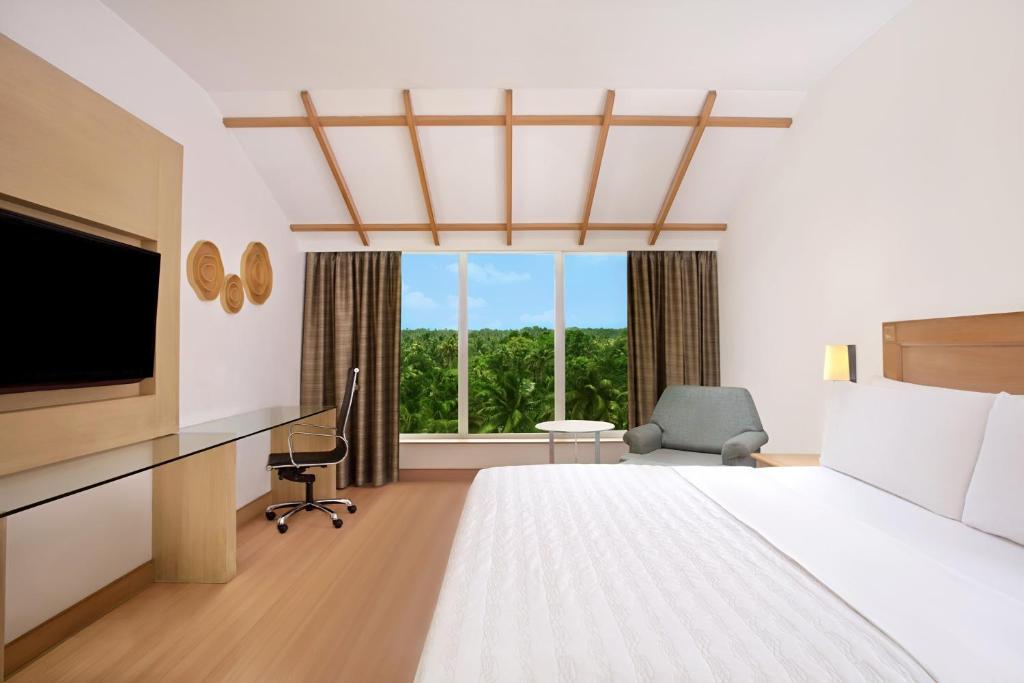 Le Meridien Kochi - Deluxe Kamer Met Kingsize Bed En Uitzicht Op Het Binnenwater Met 10% Korting Op Eten En Drinken
