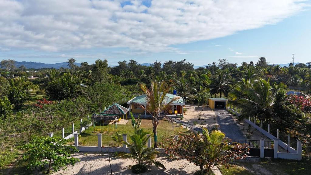 an aerial view of a garden with a house at Le tournesol Belle villa in Maroantsetra Airport