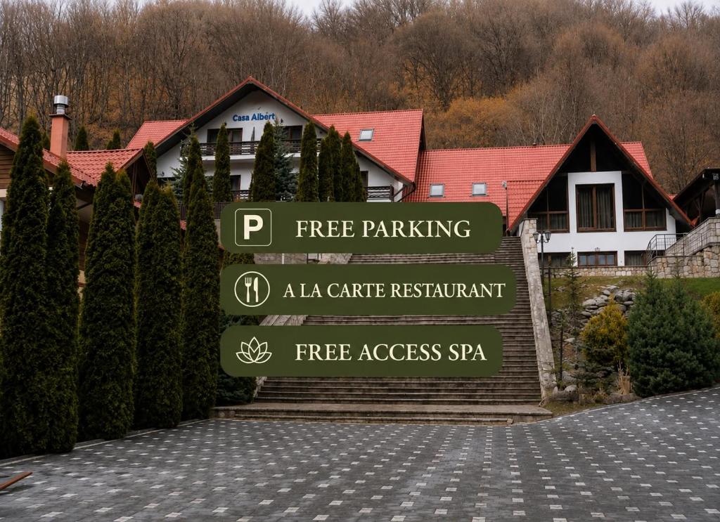 a sign for a free parking at aale gate restaurant at Albert Mountain Retreat & SPA in Lepşa