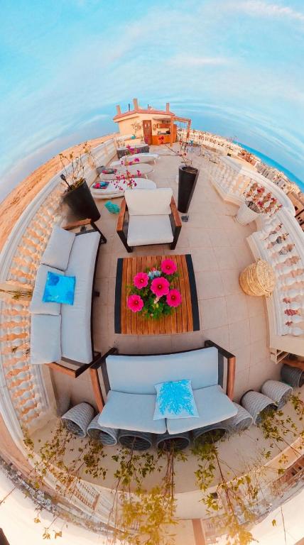 an aerial view of a boat in the water at Private sea view Penthouse New apartment Pool and Jacuzzi in Montazah in Sharm El Sheikh