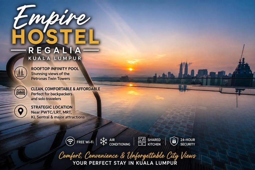 a poster for a hotel with a view of the city at Empire Hostel Regalia in Kuala Lumpur