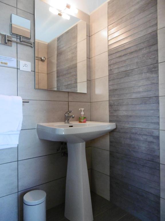 Koupelna v ubytování Hôtel le Littoral