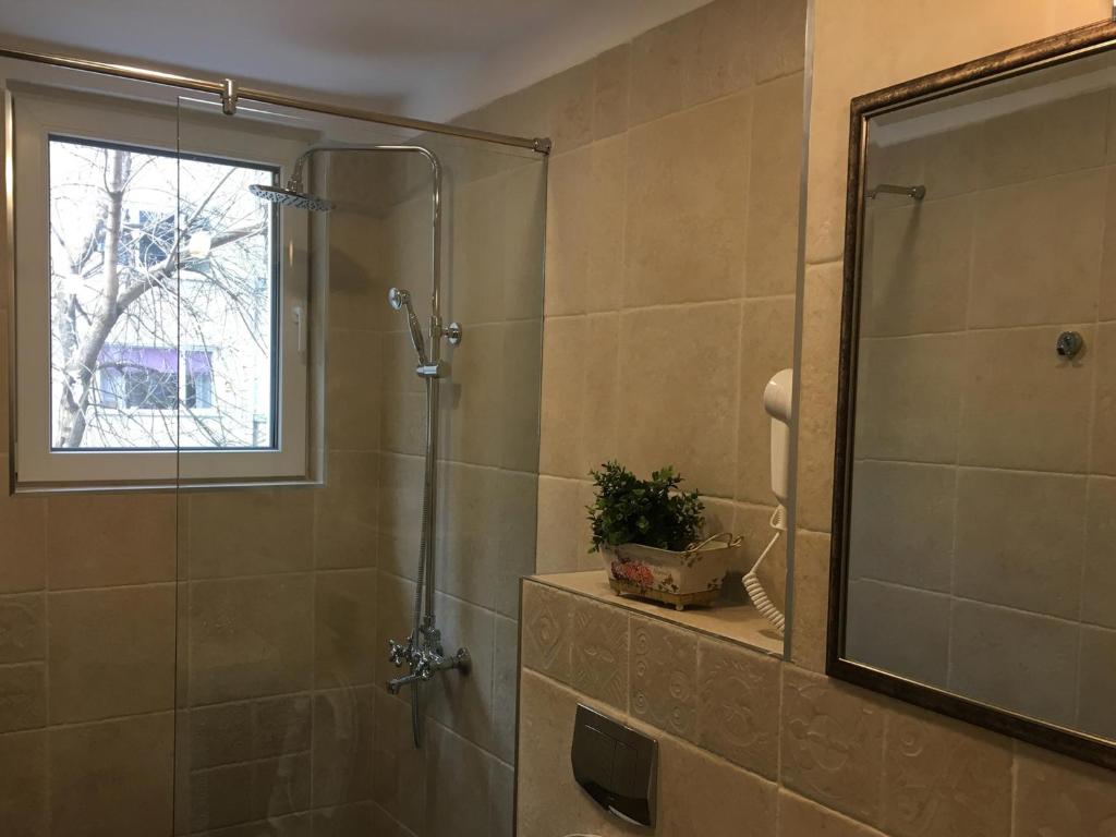 Koupelna v ubytování Family Hotel Agoncev