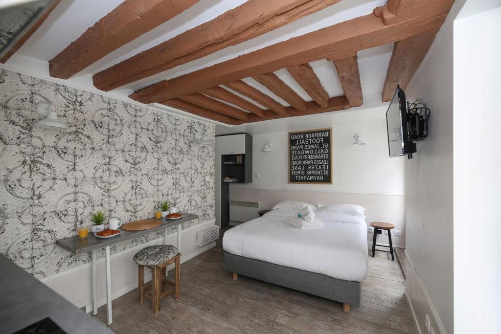 Studio parisien 20m2 en face du musee Grevin - 2P