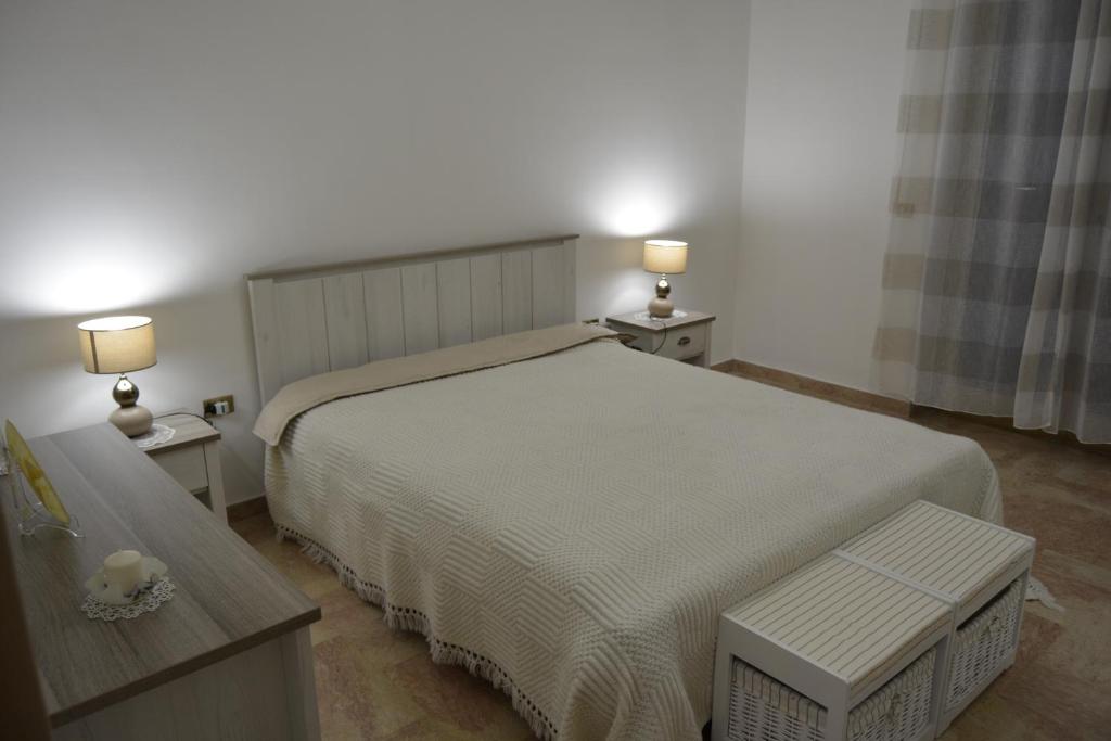 Ένα ή περισσότερα κρεβάτια σε δωμάτιο στο Casa Angy