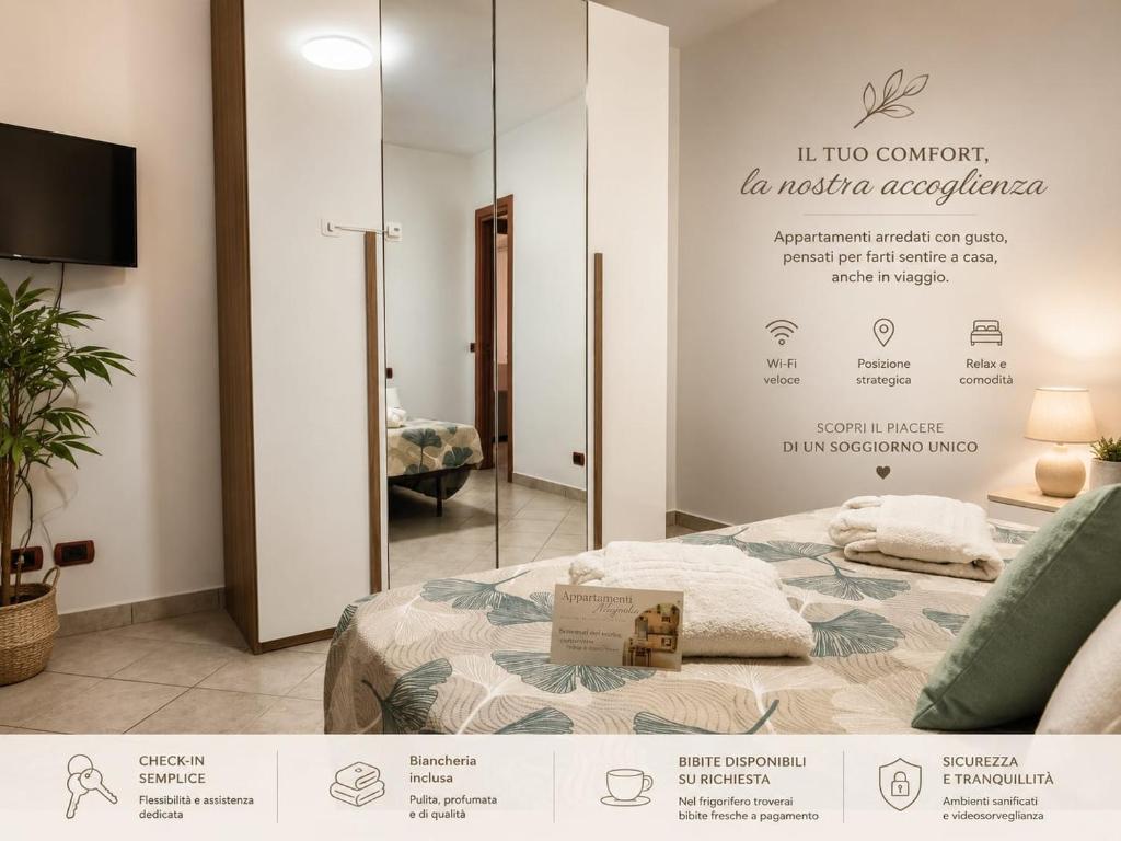 a room with a bed with a sign on the wall at Appartamento Magnolia 325 in Pomezia