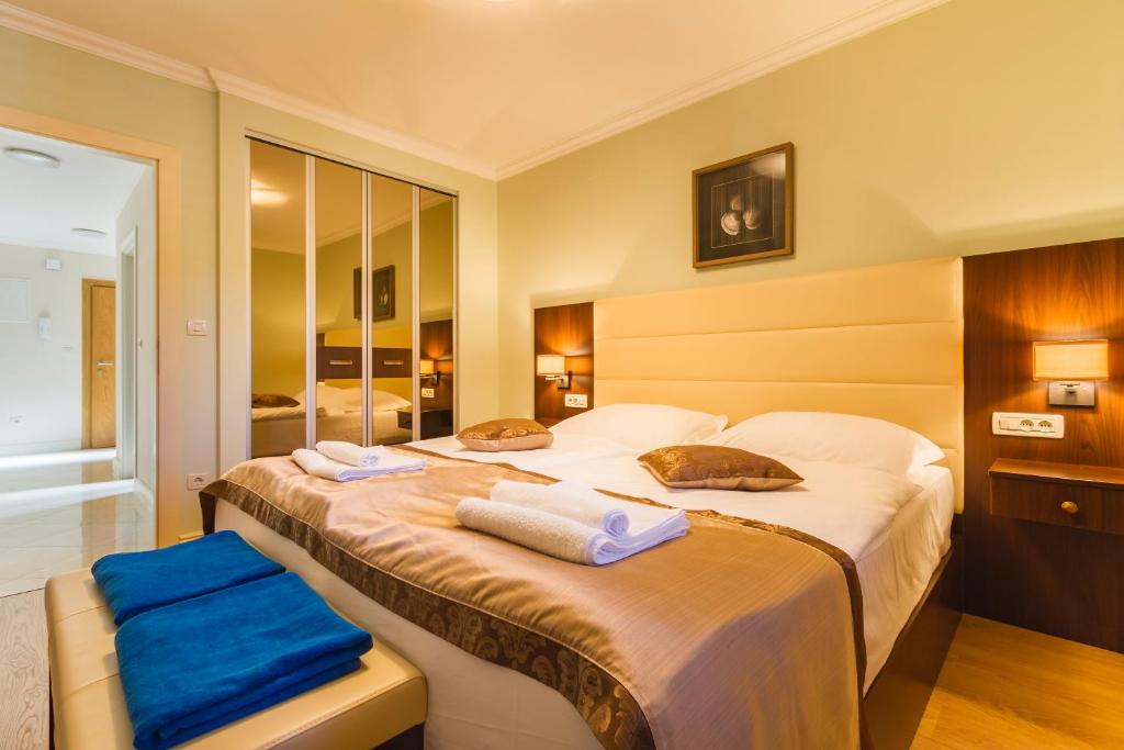 Postel nebo postele na pokoji v ubytování Luxury Apartments Villa Matea