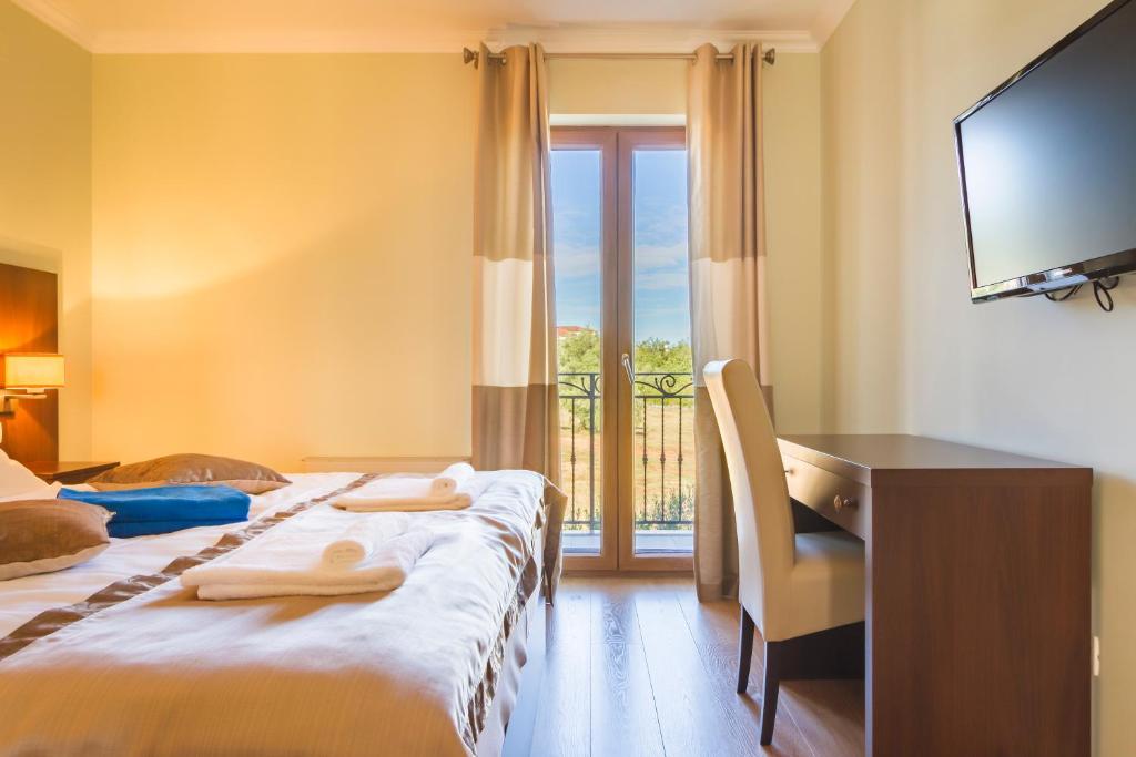 Postel nebo postele na pokoji v ubytování Luxury Apartments Villa Matea