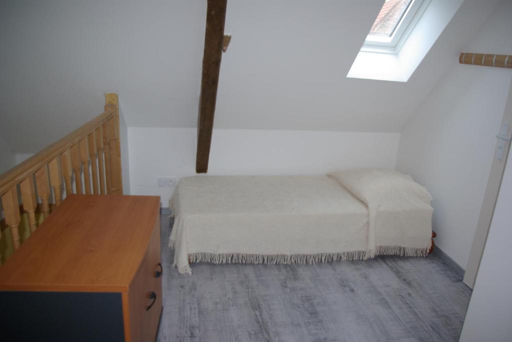 Postel nebo postele na pokoji v ubytování Gîte Caribou