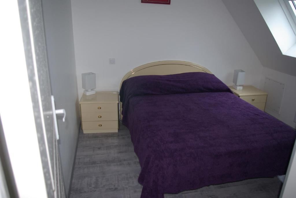 Postel nebo postele na pokoji v ubytování Gîte Caribou