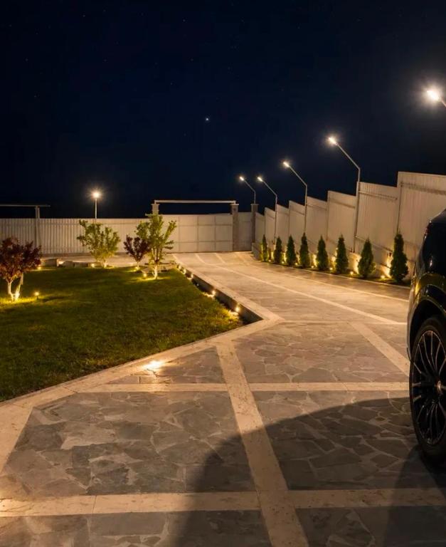 a car parked in a parking lot at night at Millenium Villa in Kʼanakʼerravan