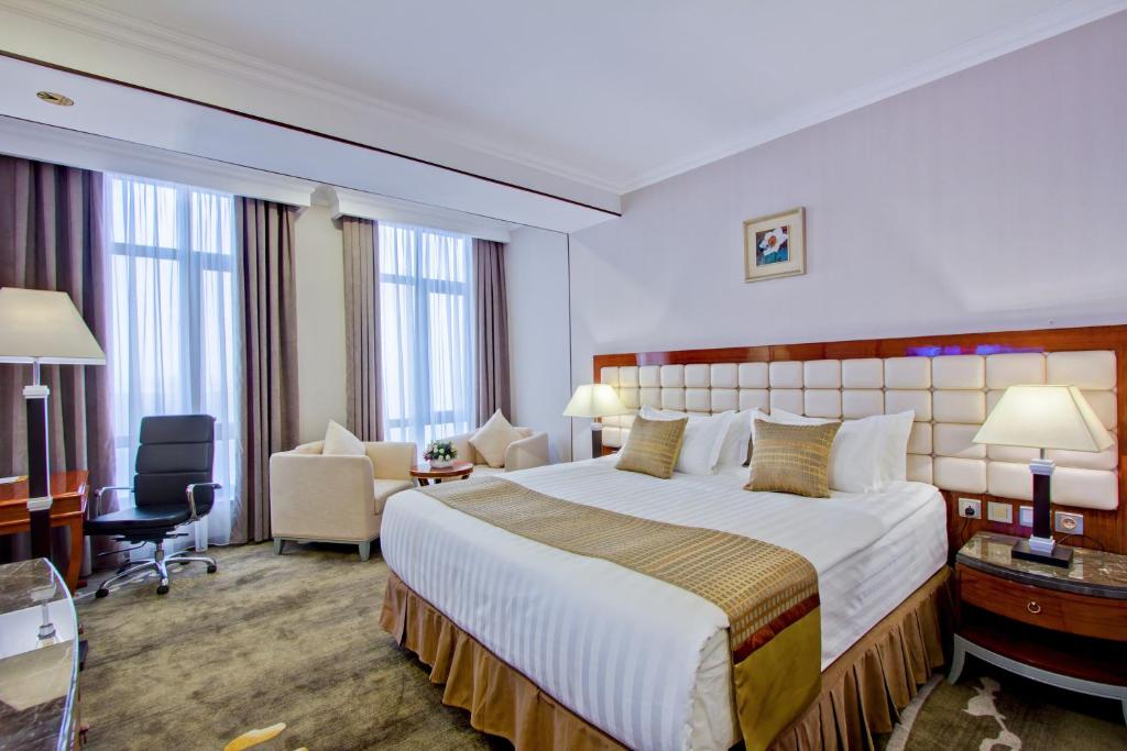 Postel nebo postele na pokoji v ubytování Hotel Lulu