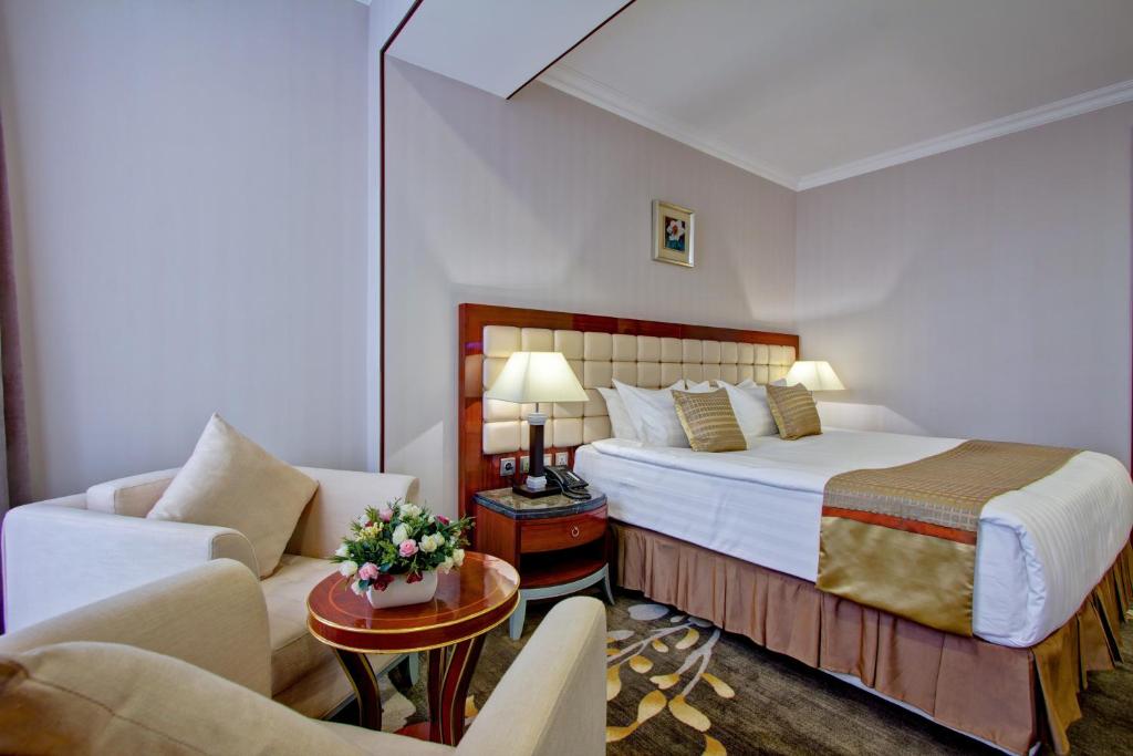 Postel nebo postele na pokoji v ubytování Hotel Lulu