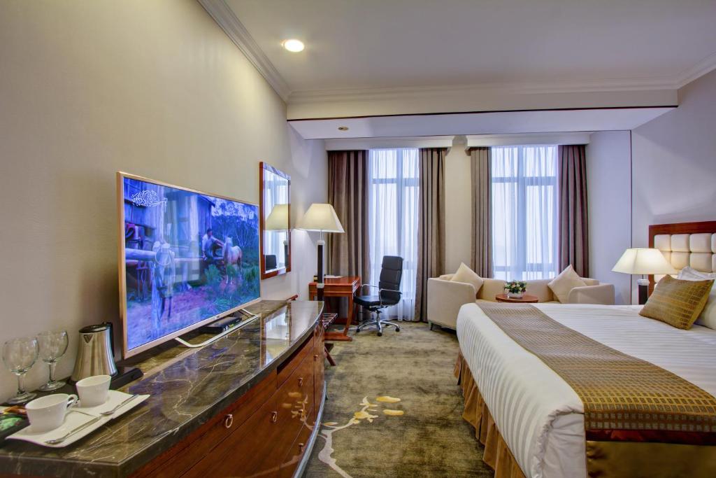 Postel nebo postele na pokoji v ubytování Hotel Lulu