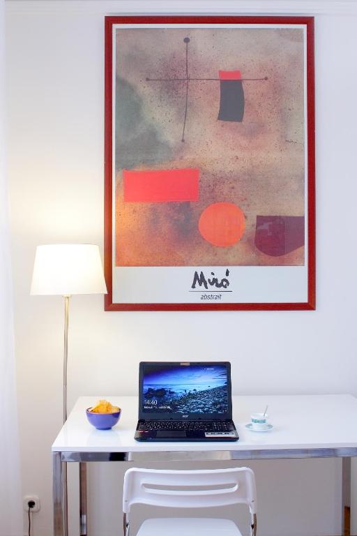 Televízia a/alebo spoločenská miestnosť v ubytovaní City Centre Cosy Apartments
