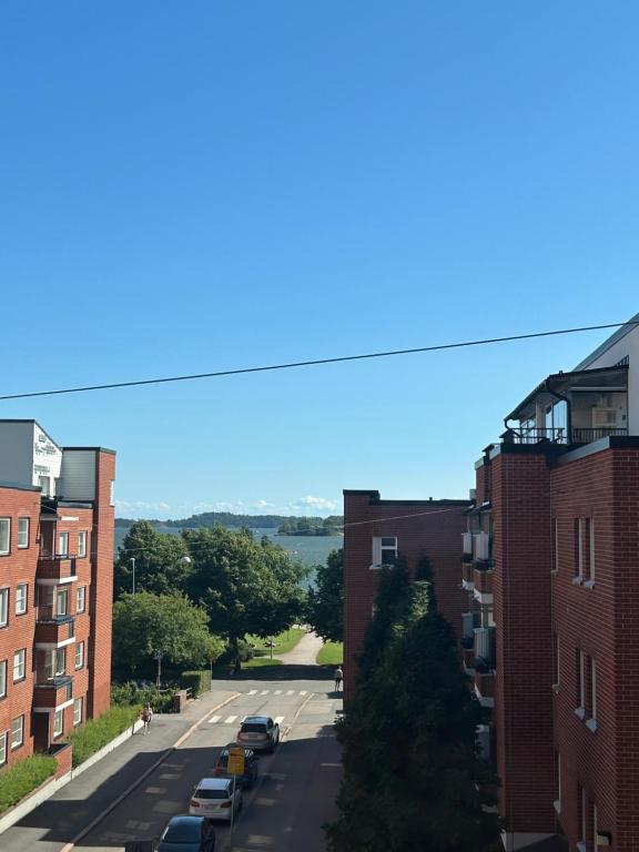 a view of a city street with buildings at Happy house katajanokka in Helsinki