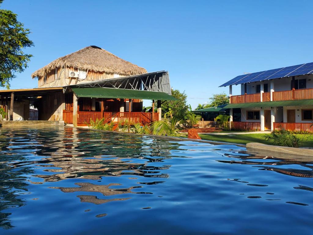 a view of a resort from the water at Dani's Guesthouse in Las Galeras