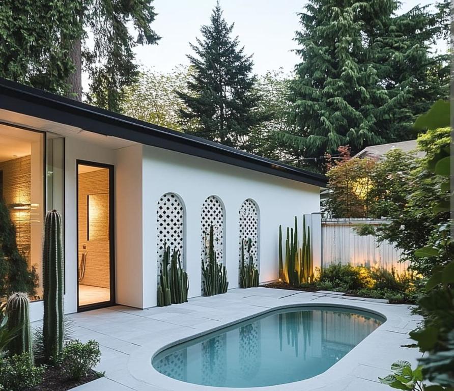a swimming pool in the yard of a house at The corbett story in Rāmnagar