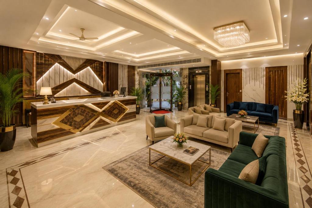 a large living room with couches and a table at Hotel Star Villa City Centre Connaught Place - Airport Pick Up & Drop in New Delhi